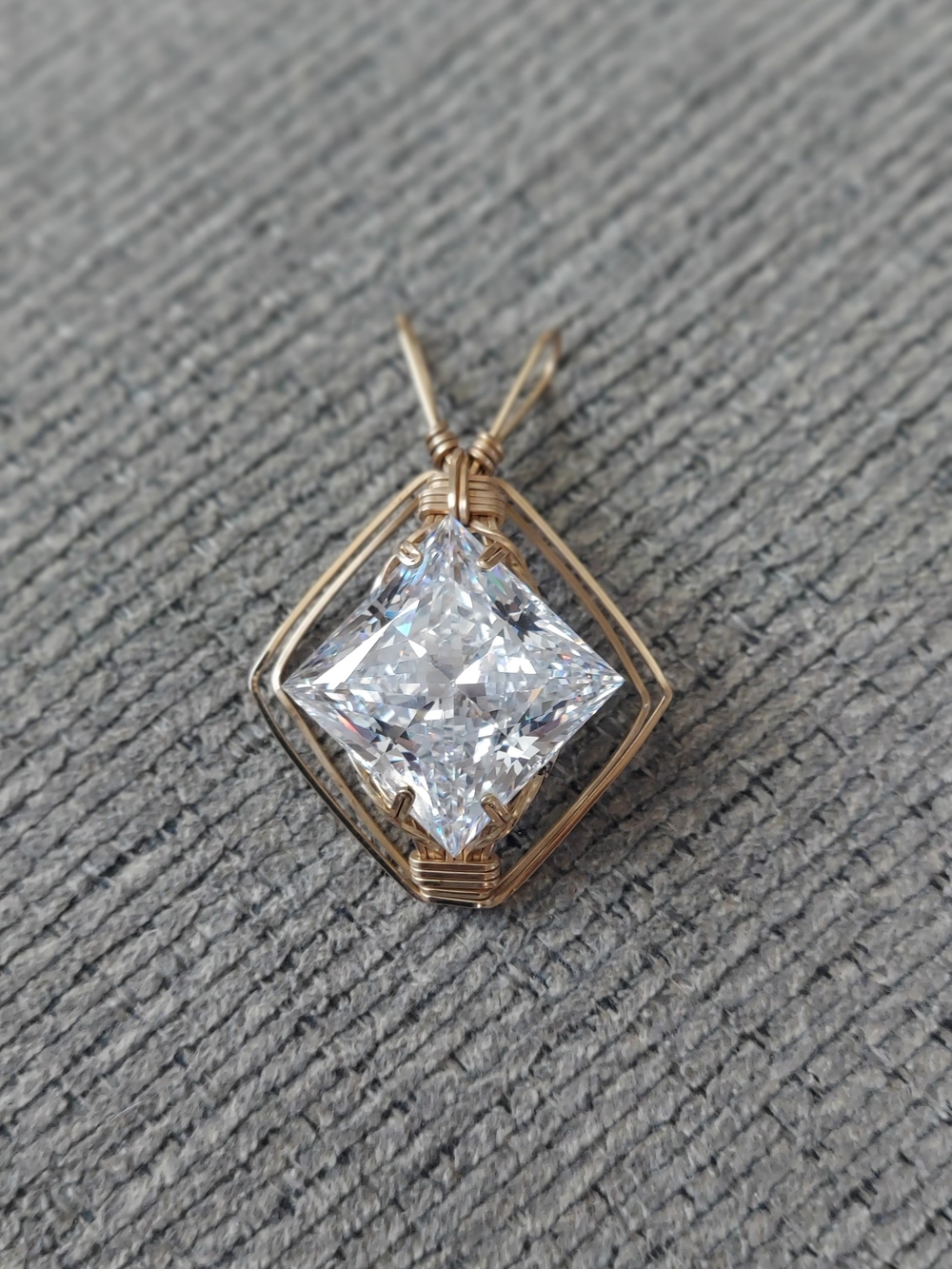 Gold-Tone Wireframe Necklace with Clear Cushion-Cut Gemstone